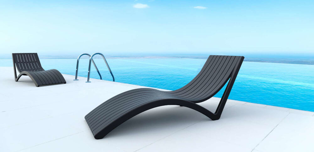 siesta slim sunlounger by pool